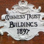 The Guinness Trust plaque on wall