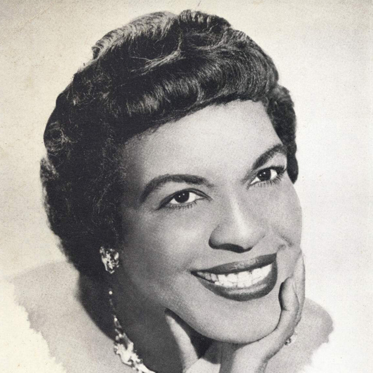 mono 1950s photograph of an attractive black woman