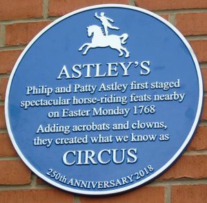blue plaque in roupell street london se1 marking astley's circus premises