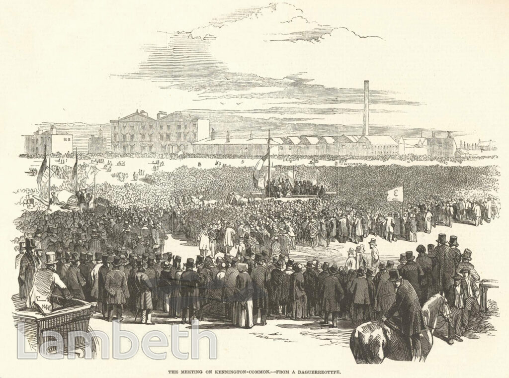 Victorian-era line drawing of a gathering of men in a park, many in top hats, a speakers platform in the middle, industrial buildings in the background